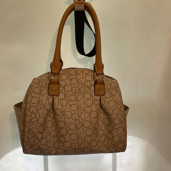 Calvin Klein Handbags - Calvin Klein women’s bag lightly use stains inside